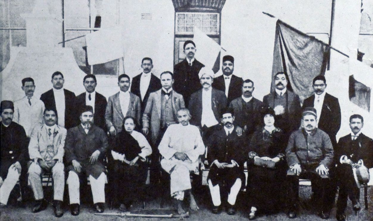 Mohandas Karamchand Gandhi and his wife Kasturba with Indian community leaders