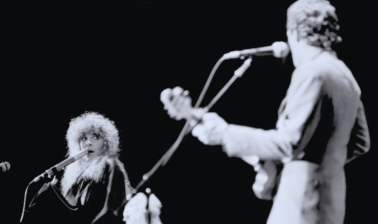 Gettyimages - 548758233, Fleetwood Mac At The LA Forum American musicians Stevie Nicks of the group Fleetwood Mac performs onstage at the Los Angeles Forum, Inglewood, California, December 6, 1979. In the foreground is American musician Lindsey Buckingham.