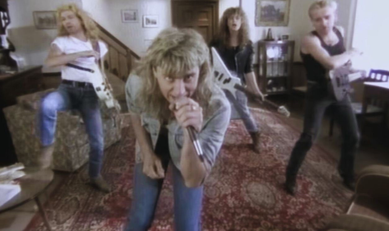 Screenshot from Pour Some Sugar on Me (1987)