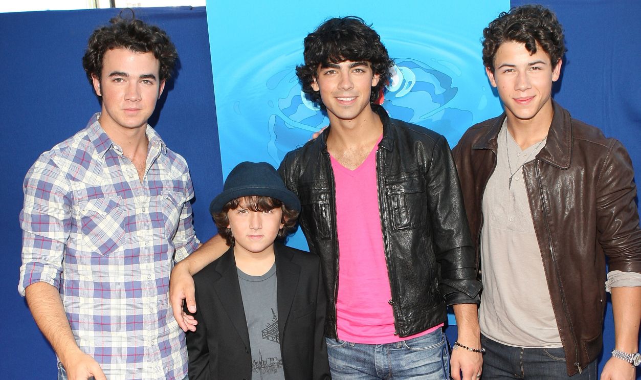 Frankie Jonas, Joe Jonas, Kevin Jonas, and Nick Jonas of The Jonas Brothers arrive at a special screening of Walt Disney Pictures'