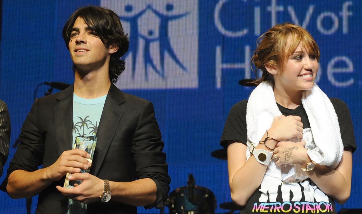 Joe Jonas of The Jonas Brothers and actress/singer Miley Cyrus at the City of Hope Benefit Concert with Miley Cyrus & Jonas Brothers at the Gibson Amphitheater Universal City Walk on September 14, 2008 in Los Angeles, California. ****EXCLUSIVE****