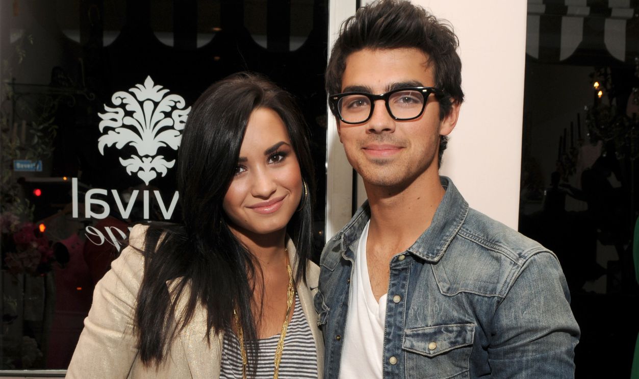 Demi Lovato and Joe Jonas attend the grand opening of boutique Revival Vintage on April 28, 2010 in Los Angeles, California.