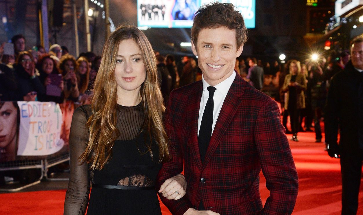 Eddie Redmayne (R) and wife Hannah Bagshawe attend the UK Film Premiere of
