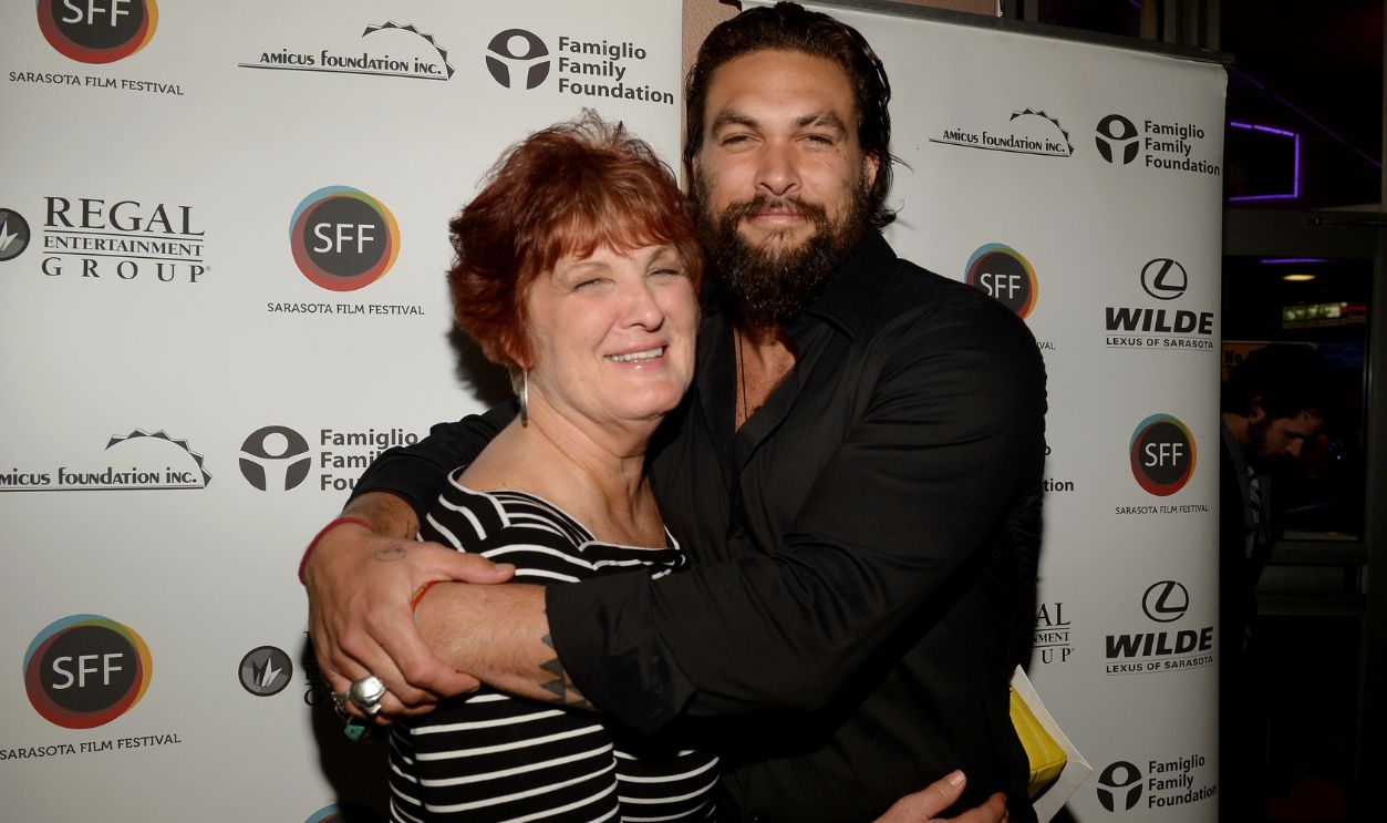 Actor /director Jason Momoa (R) and his mother Coni Momoa arrive to a screening of 'Road to Paloma' during the Sarasota Film Festival at Regal Cinemas Hollywood Stadium on April 12, 2014 in Sarasota, Florida. 