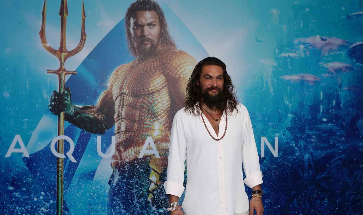 Jason Momoa poses at the Australian premiere of Aquaman on December 18, 2018 in Gold Coast, Australia.