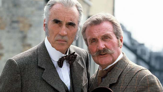 Actors Christopher Lee (L) and Patrick Macnee pose on a shoot for the TV movie 'Sherlock Holmes and the Leading Lady' on 1991 ca. in London, England. 