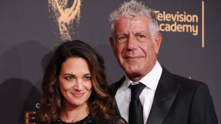 LOS ANGELES, CA - SEPTEMBER 09: Asia Argento and Anthony Bourdain attend the 2017 Creative Arts Emmy Awards at Microsoft Theater on September 9, 2017 in Los Angeles, California.