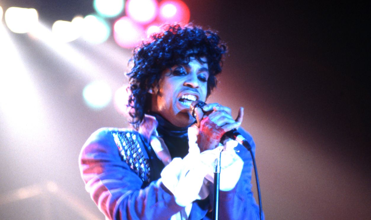 American singer Prince (1958-2016) performs onstage during the 1984 Purple Rain Tour on November 4, 1984, at the Joe Louis Arena in Detroit, Michigan.
