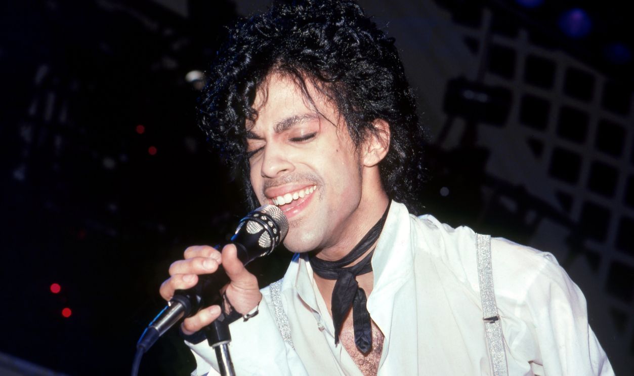 American singer, songwriter, musician, record producer, dancer, actor, and filmmaker Prince (1958-2016) performs onstage during the 1984 Purple Rain Tour on November 7, 1984, at the Joe Louis Arena in Detroit, Michigan