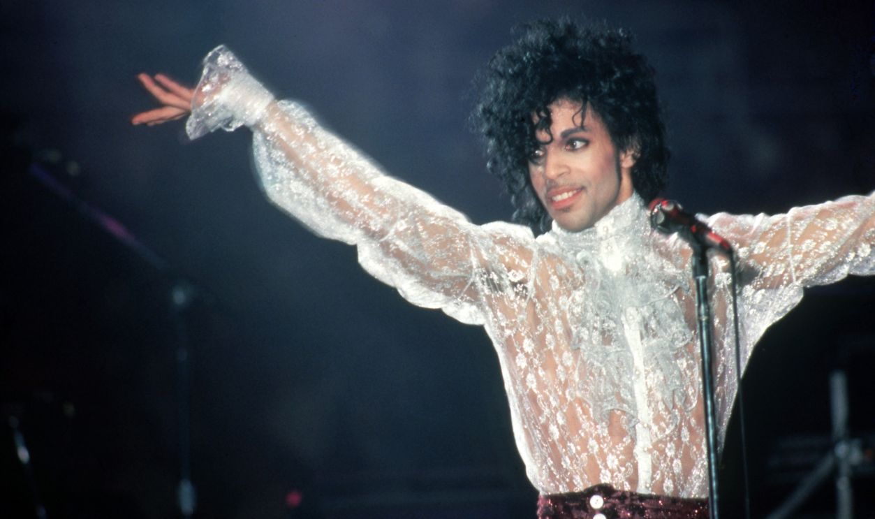 American singer, songwriter, musician, record producer, dancer, actor, and filmmaker Prince (1958-2016) performs onstage during the 1984 Purple Rain Tour on November 4, 1984, at the Joe Louis Arena in Detroit, Michigan.