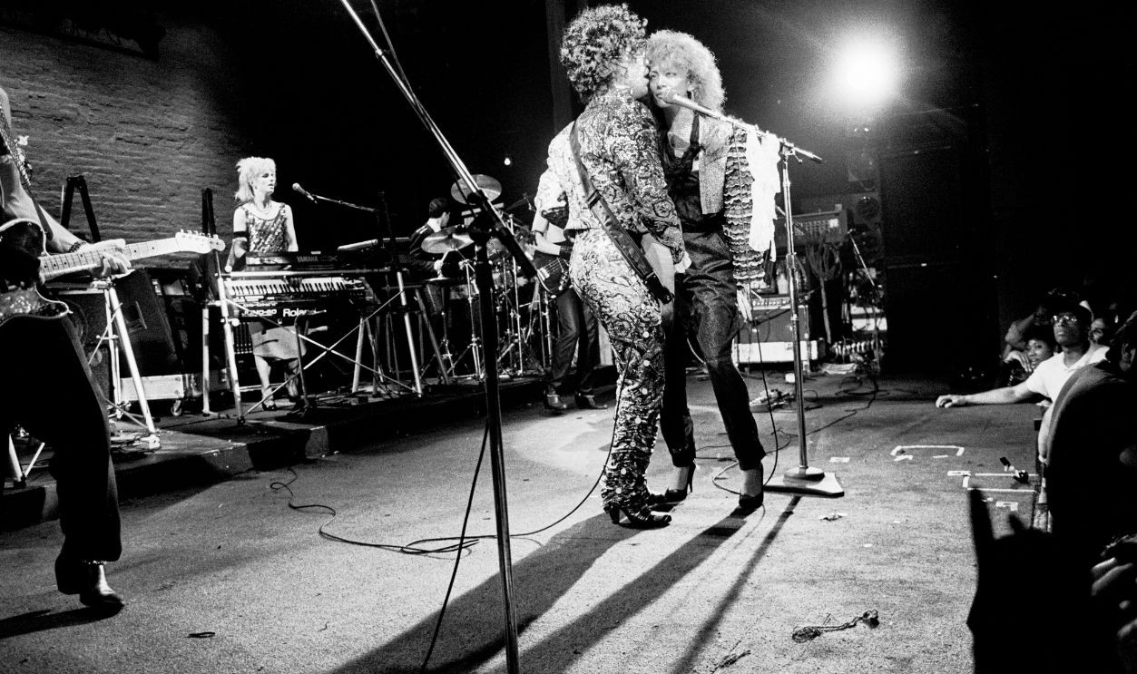 American R&B, Funk, and Rock musicians Prince (born Prince Rogers Nelson, 1958 - 2016), on electric guitar, and Sheila E (born Sheila Escovedo) perform, with the latter's band, onstage at the Ritz, New York, New York, September 13, 1984.