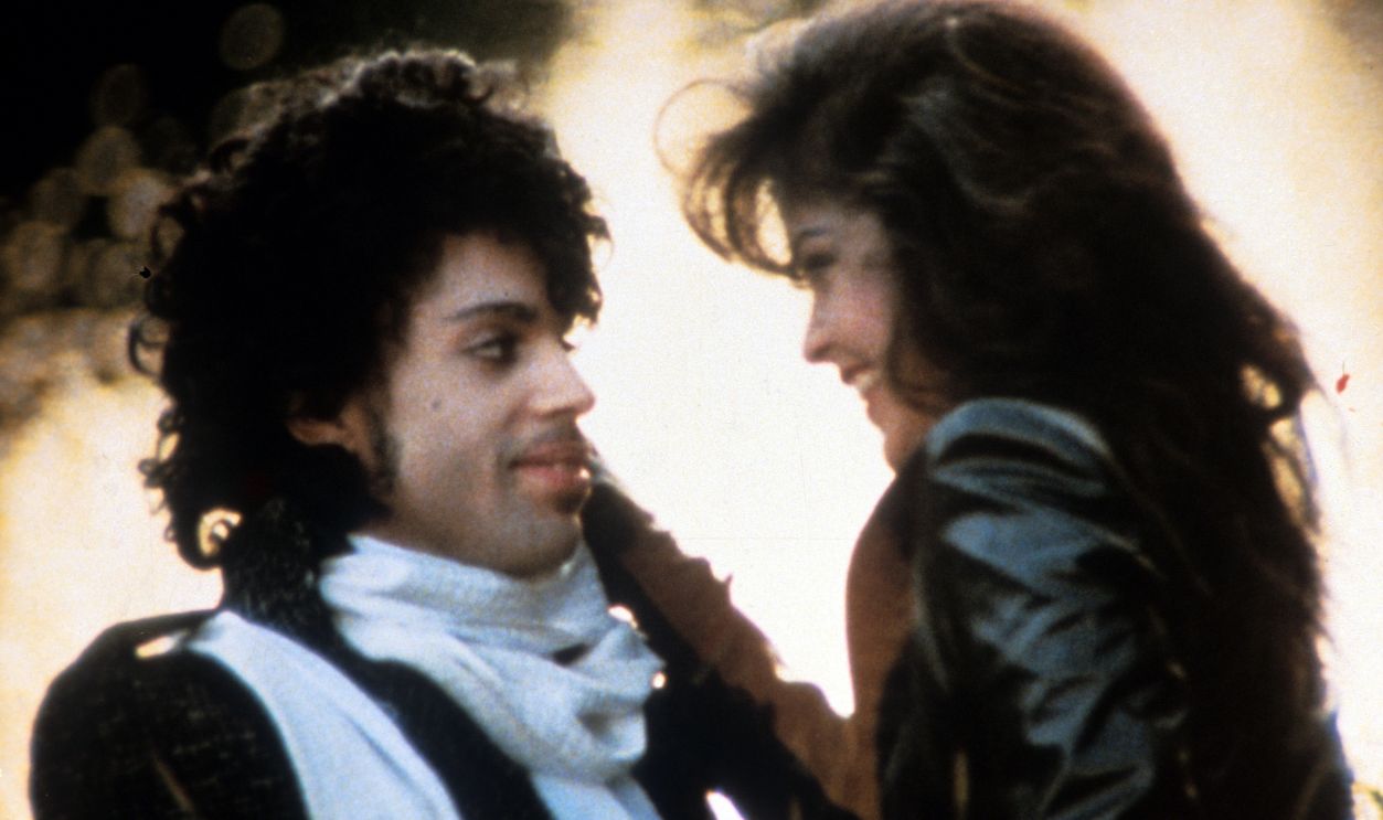 Prince embraces Apollonia Kotero in a scene from the film 'Purple Rain', 1984.