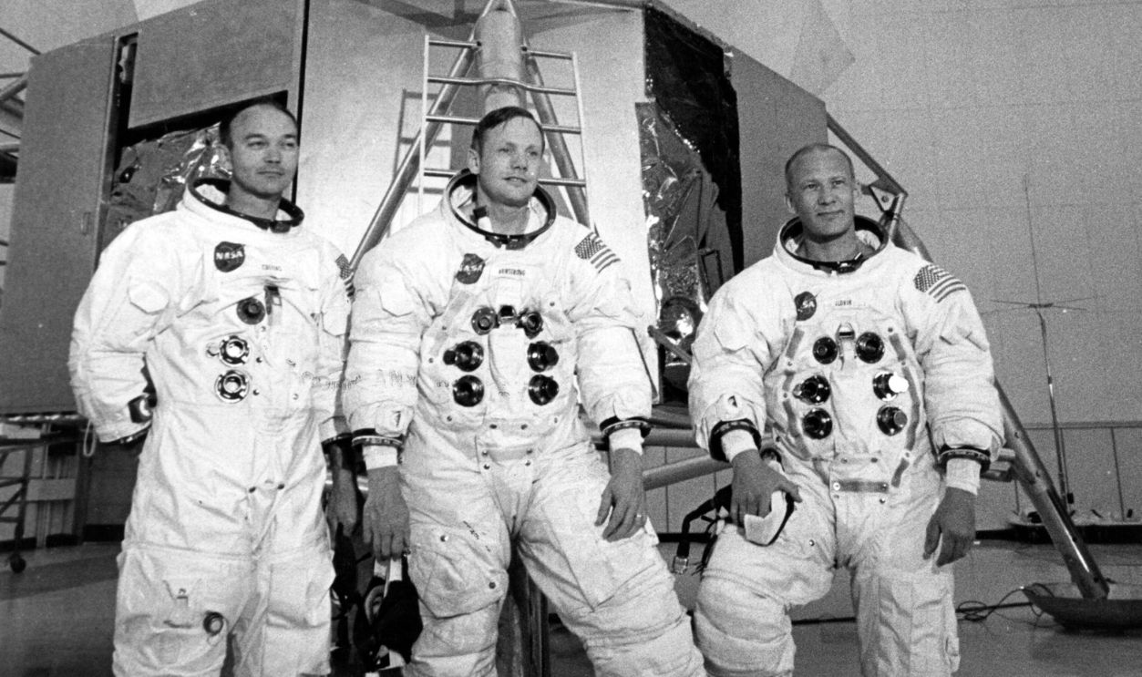 Apollo 11 astronauts Mike Collins (left), Neil Armstrong (centre), and Edwin 'Buzz' Aldrin, in front of the Lunar Landing Module Simulator at the Kennedy Space Centre, USA, prior to their landing on the moon.