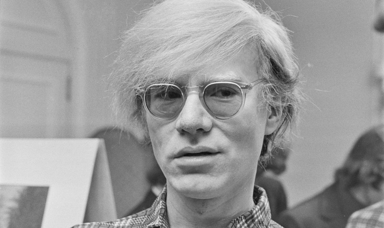 American pop artist Andy Warhol (1928 - 1987) at the Roundhouse in London, which is showing his play 'Andy Warhol's Pork', London, UK, July 1971. 
