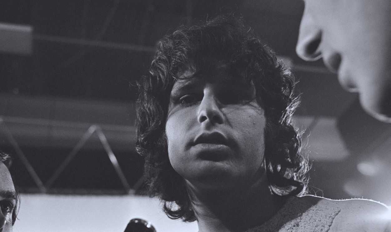 Gettyimages - 1329054439, Jim Morrison American musician Jim Morrison, vocalist with rock group The Doors, during a press conference held in the Cybernetic Serendipity exhibition at the Institute of Contemporary Arts in London on September 4, 1968.