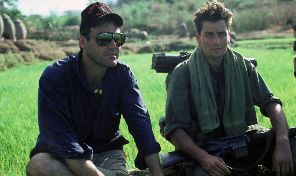 Oliver Stone and Charlie Sheen during the filming of the movie Platoon in April 1986 in the Philippines.