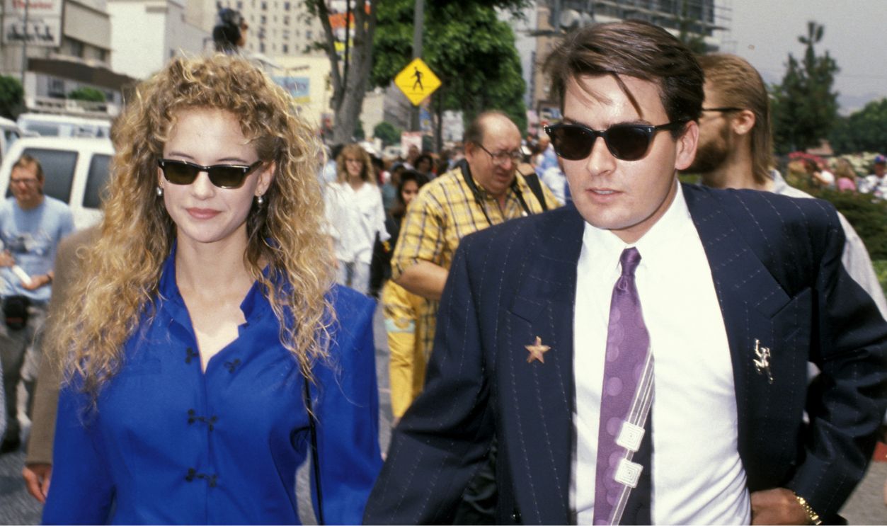 Kelly Preston and Charlie Sheen at the Hollywood Boulevard in Hollywood, California