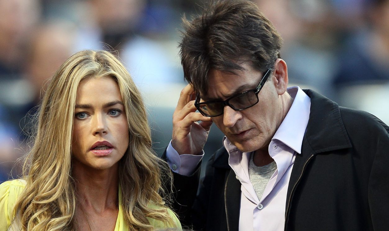 Denise Richards and Charlie Sheen look for their seats as the New York Yankees take on the New York Mets on June 23, 2012 during interleague play at Citi Field in the Flushing neighborhood of the Queens borough of New York City.
