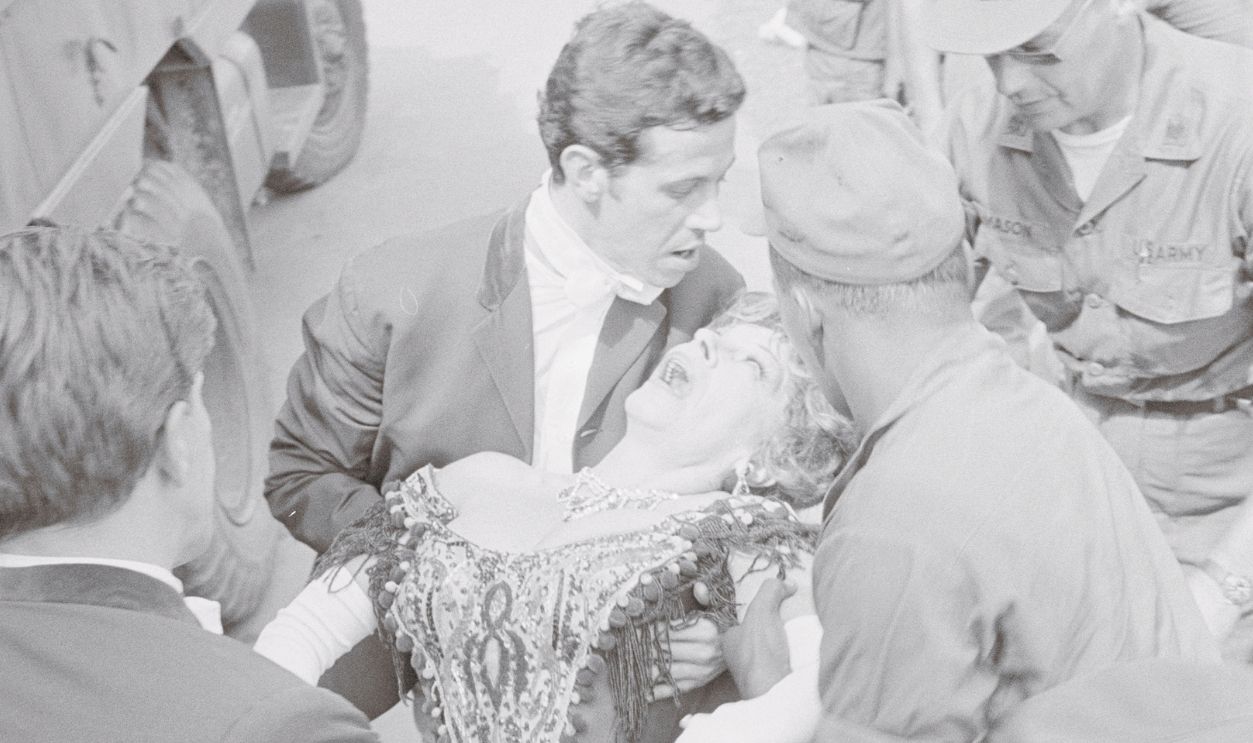 Gettyimages - 517771870, Martha Raye Being Carried Offstage