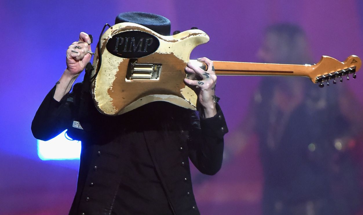 Recording artist Mick Mars of the band Motley Crue performs onstage during the 2014 iHeartRadio Music Festival at the MGM Grand Garden Arena on September 19, 2014 in Las Vegas, Nevada