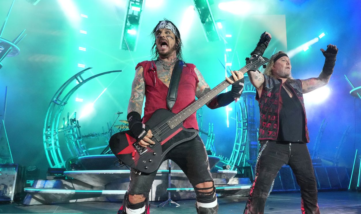 Nikki Sixx and Vince Neil of Mötley Crüe perform onstage during The Stadium Tour at Nationals Park on June 22, 2022 in Washington, DC.