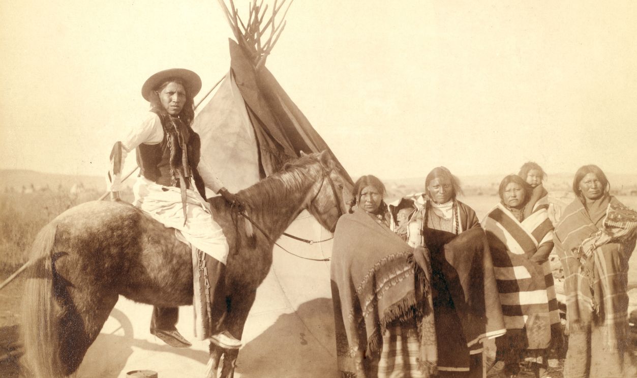 Four Lakota women standing