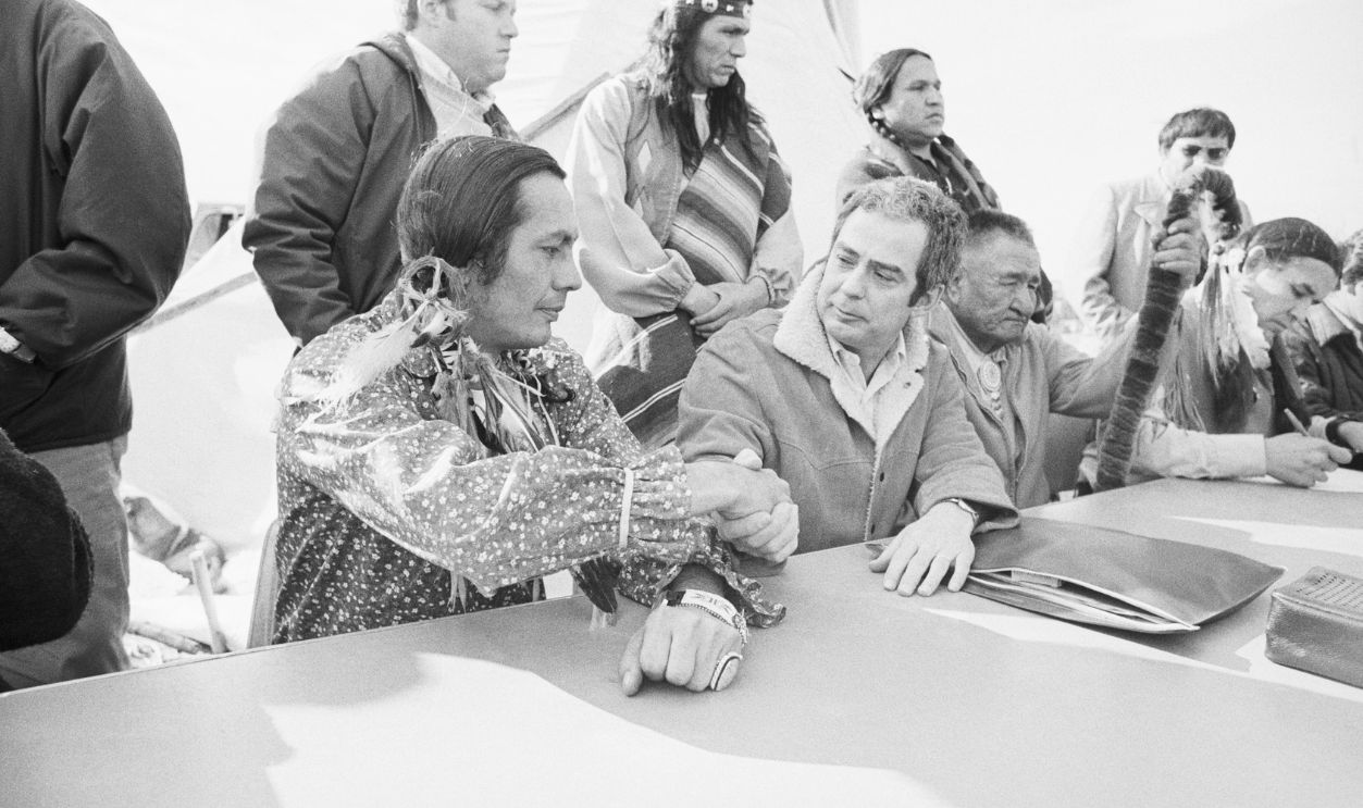 Russell Means and Kent Frizzell Shaking Hands