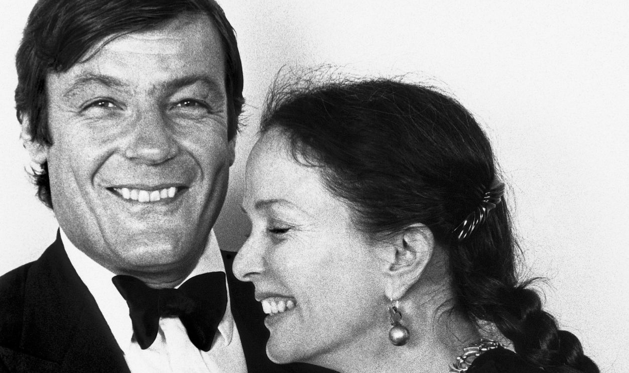 Gettyimages - 2199406476, Portrait Of Peter Duchin & Brooke Hayward Portrait of married American couple, musician & band leader Peter Duchin & actor Brooke Hayward as they share a smile, New York, New York, 1983.