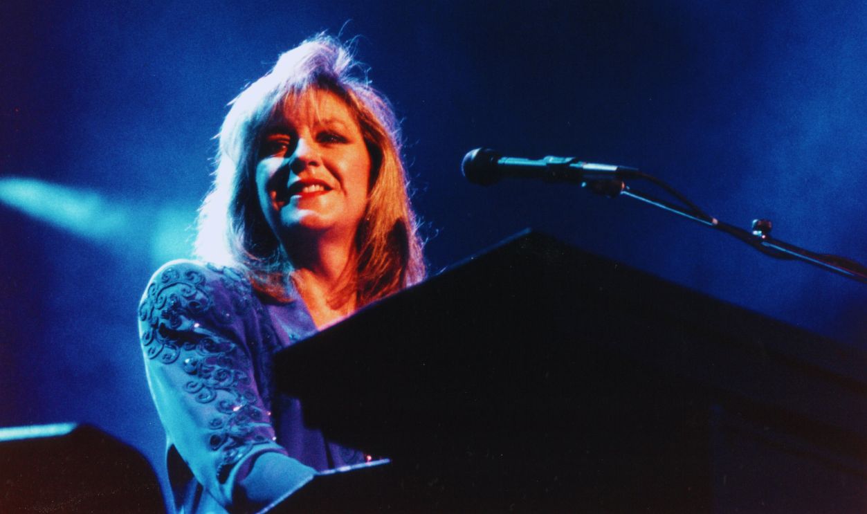 Gettyimages - 1312540362, Fleetwood Mac Performs In Minnesota BLOOMINGTON, MN - JUNE 30: Fleetwood Mac (Christine McVie) performs at the Met Center in Bloomington, Minnesota on June 30, 1990.
