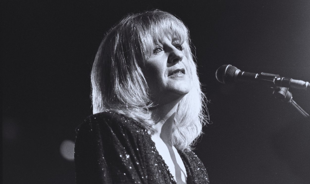 Gettyimages - 1216279556, Christine McVie Performing In Concert With Fleetwood Mac Singer, songwriter and keyboardist Christine McVie is shown performing on stage during a 