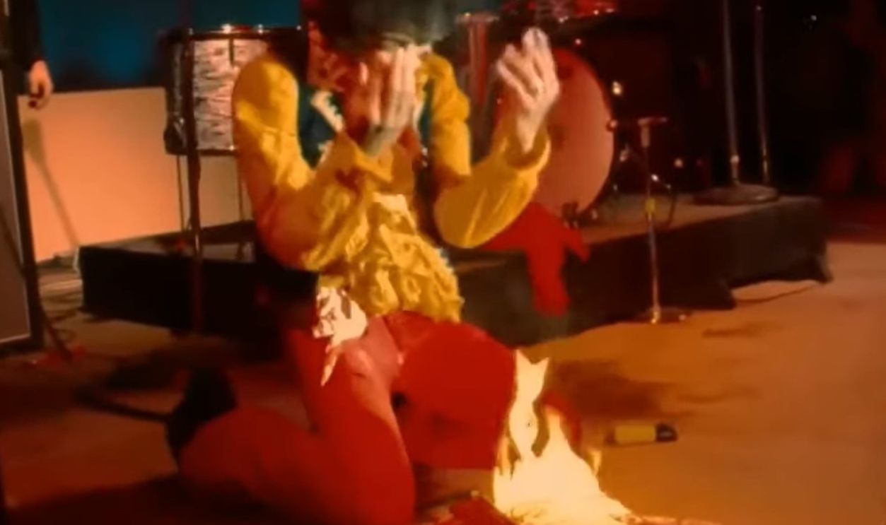 Jimi Hendrix sets guitar on fire