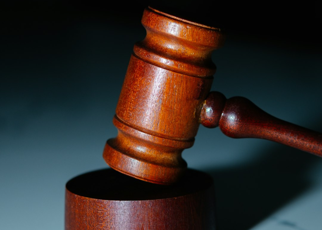a wooden judge's hammer on top of a table