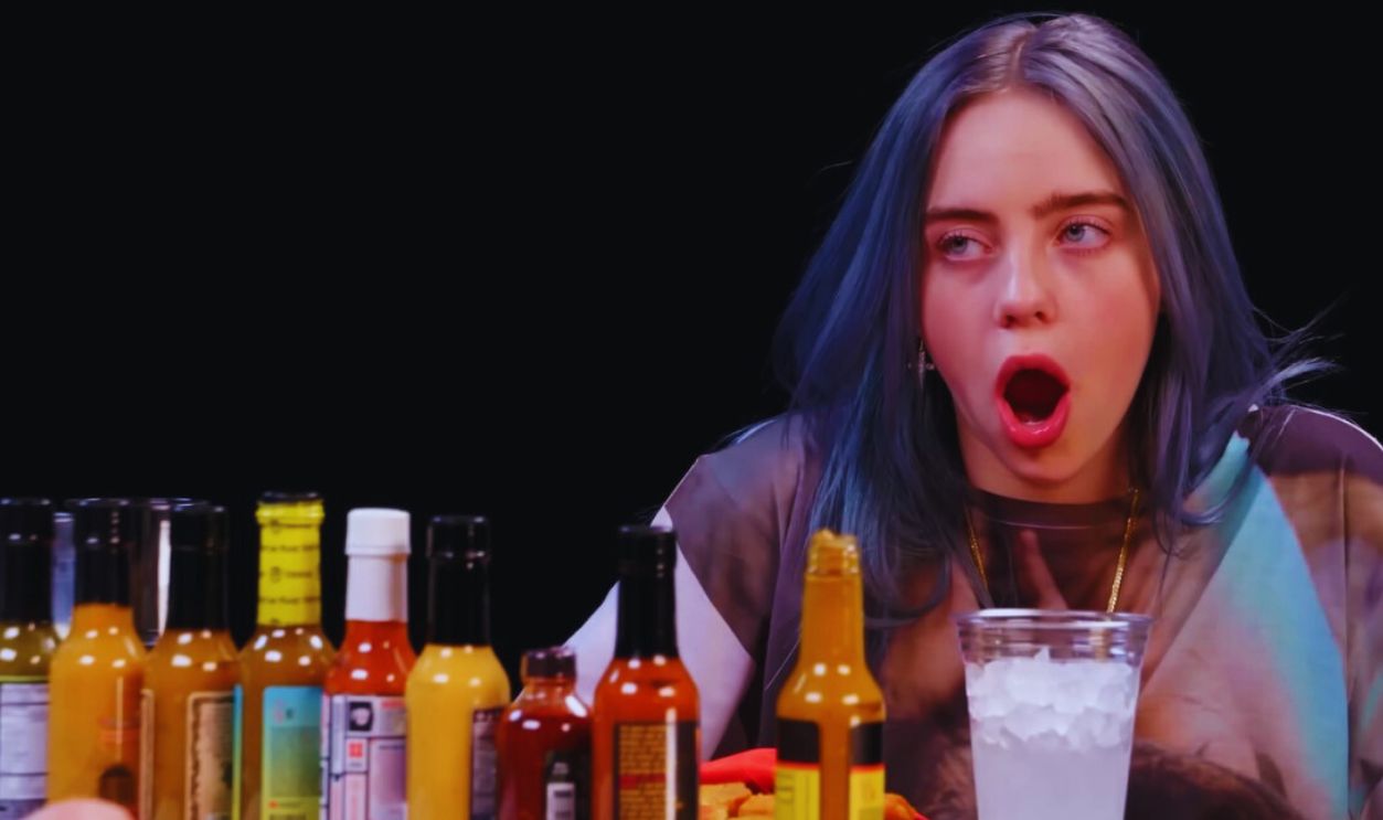 Billie Eilish Freaks Out While Eating Spicy Wings