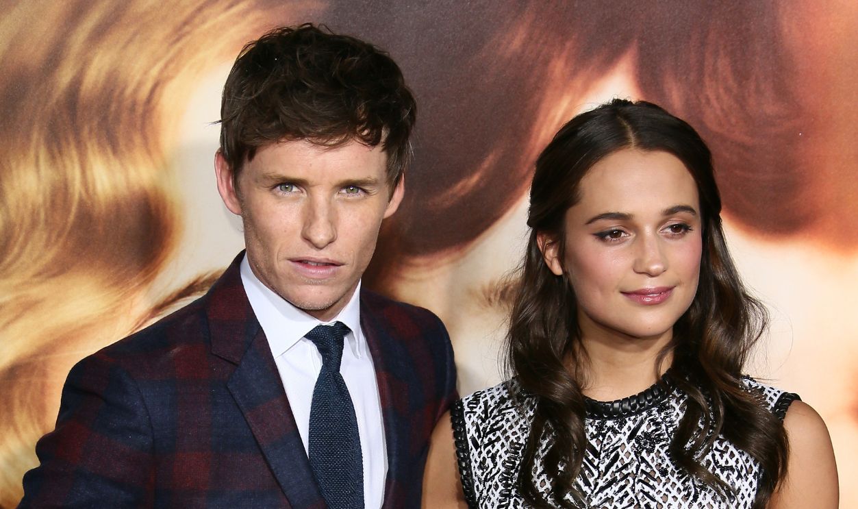 Eddie Redmayne and Alicia Vikander attend the premiere of Focus Features' 'The Danish Girl' at Westwood Village Theatre on November 21, 2015 in Westwood, California.