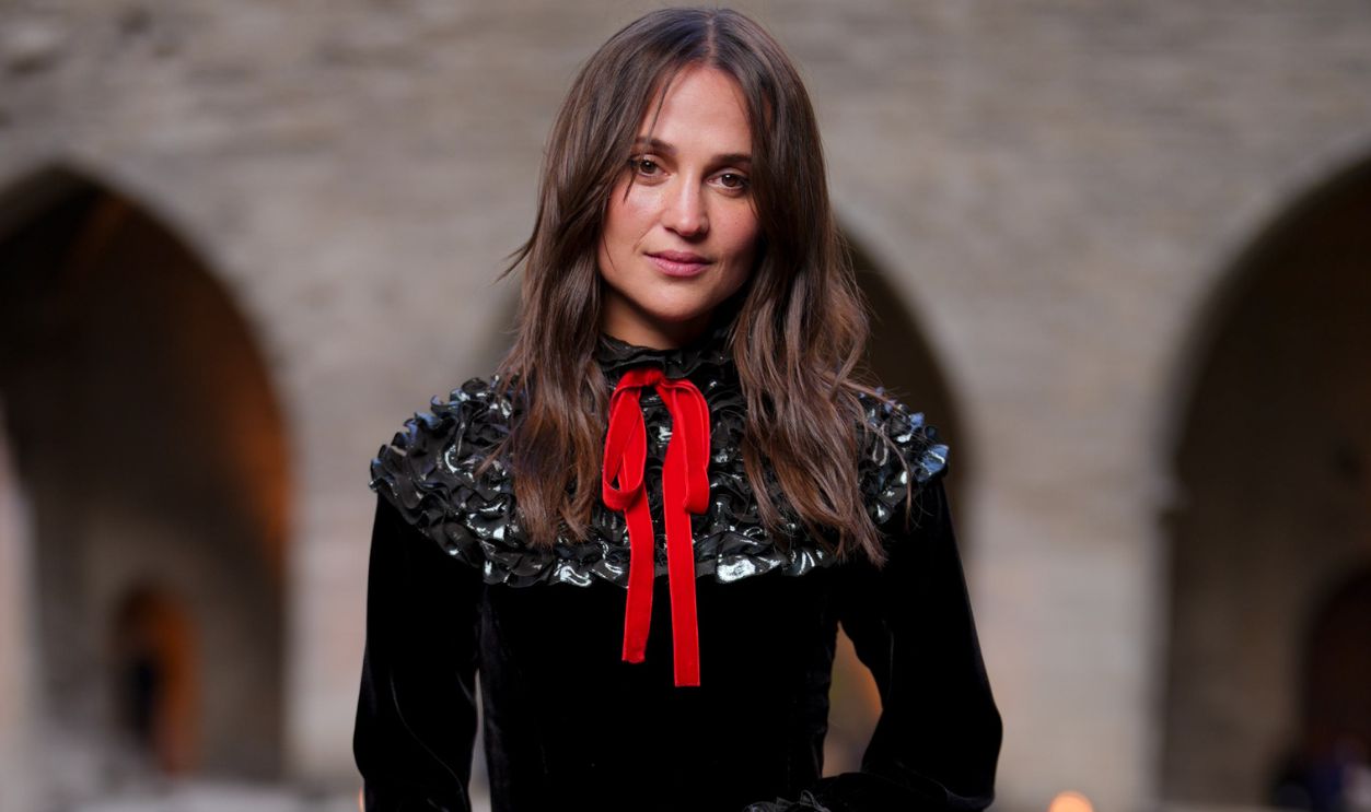 Alicia Vikander at the Louis Vuitton Cruise 2026 show held at the Palais des Papes on May 22, 2025 in Avignon, France.