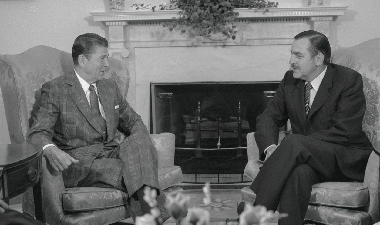 President Reagan meets with South African Foreign Minister Rolf Botha, in the Oval Office of the White House. The 30 minute meeting was arranged at Reagan's request and followed three hours of talks between Botha and Secretary of State Alexander Haig. The meetings represented the first high level contacts between the two nations since Botha was last in Washington, in 1978, and had sharp disagreements with the Carter administration on human rights.
