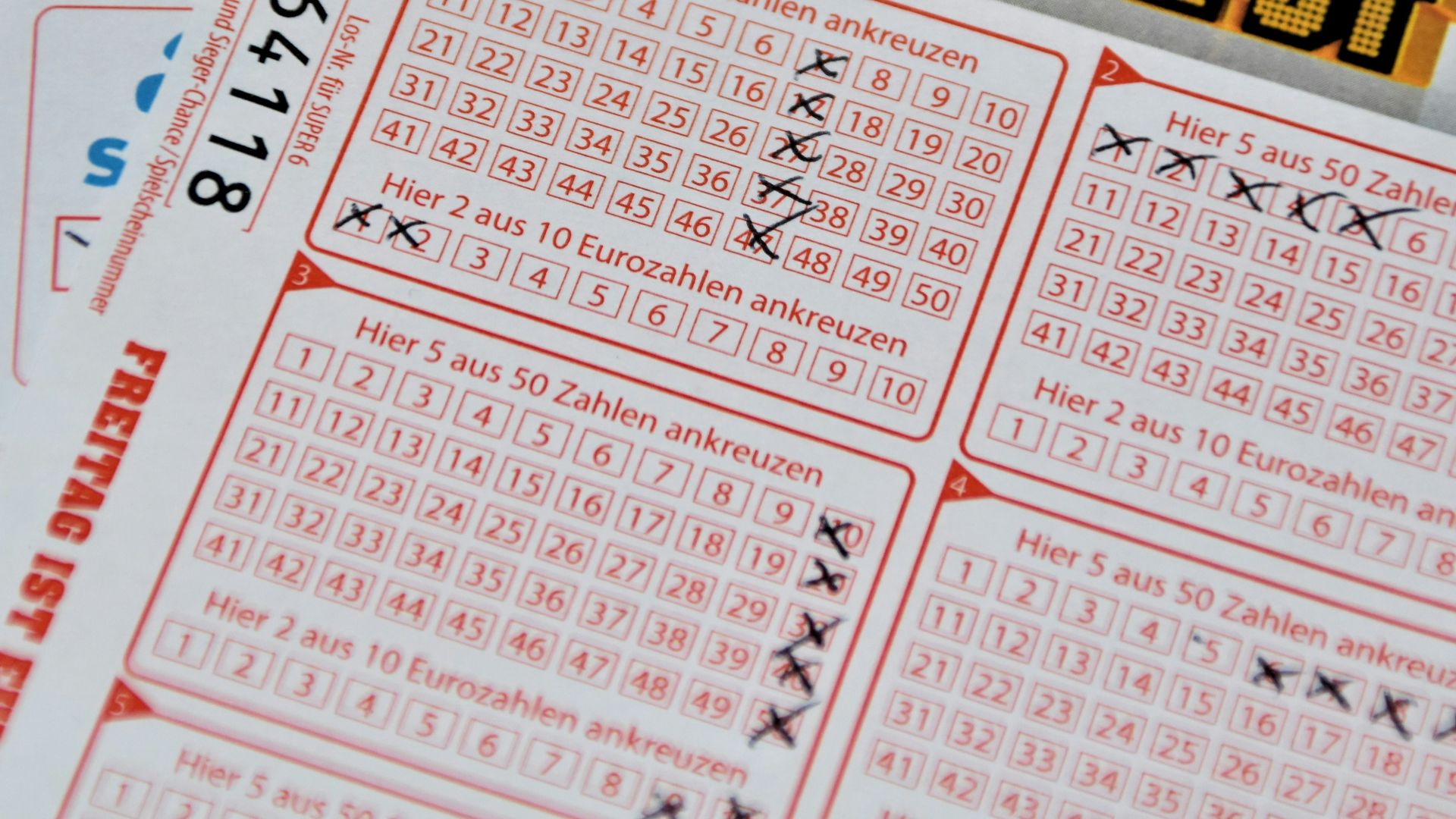 white and red calendar on white wall