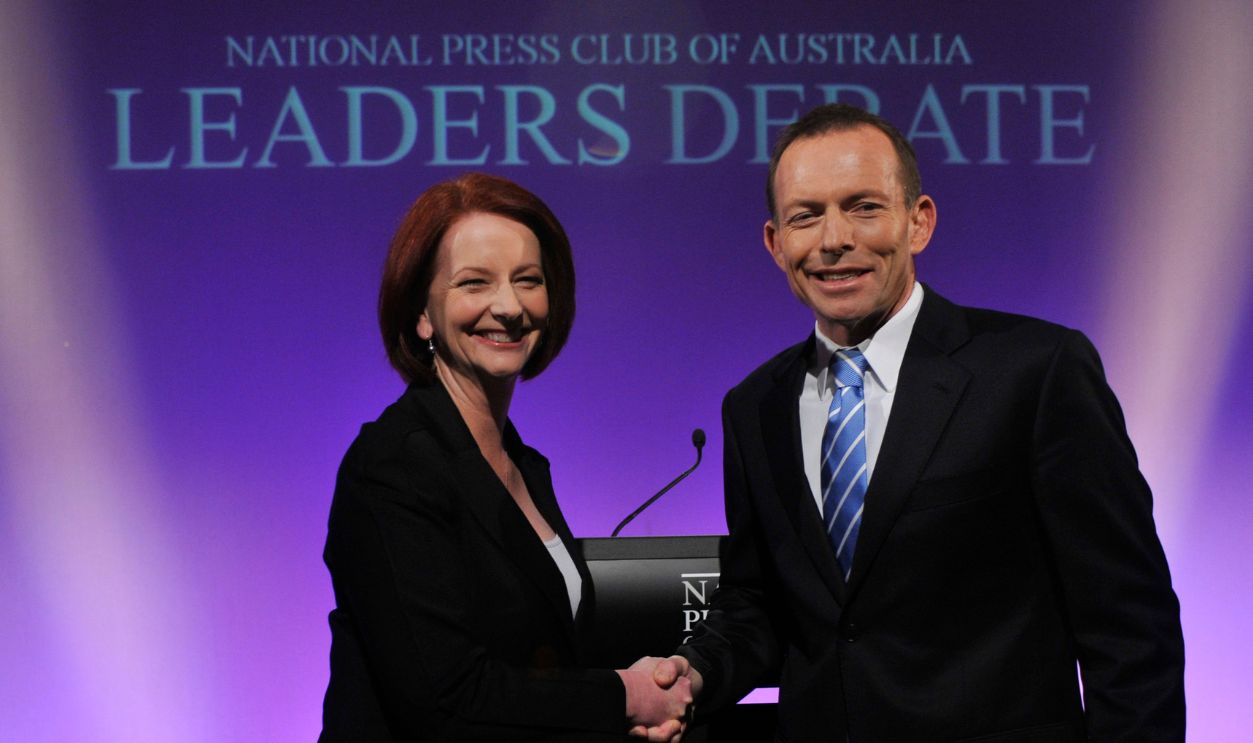 Australian Prime Minister Julia Gillard shakes hands with Opposition Leader Tony Abbott ahead of the first leaders debate at the National Press Club on July 25, 2010 in Canberra, Australia. Gillard and Abbott will go head-to-head in what is expected to be the only debate prior to the August 21 federal election. The debate was brought forward from its traditional time of 7:30pm to avoid a clash with the popular cooking show MasterChef. 