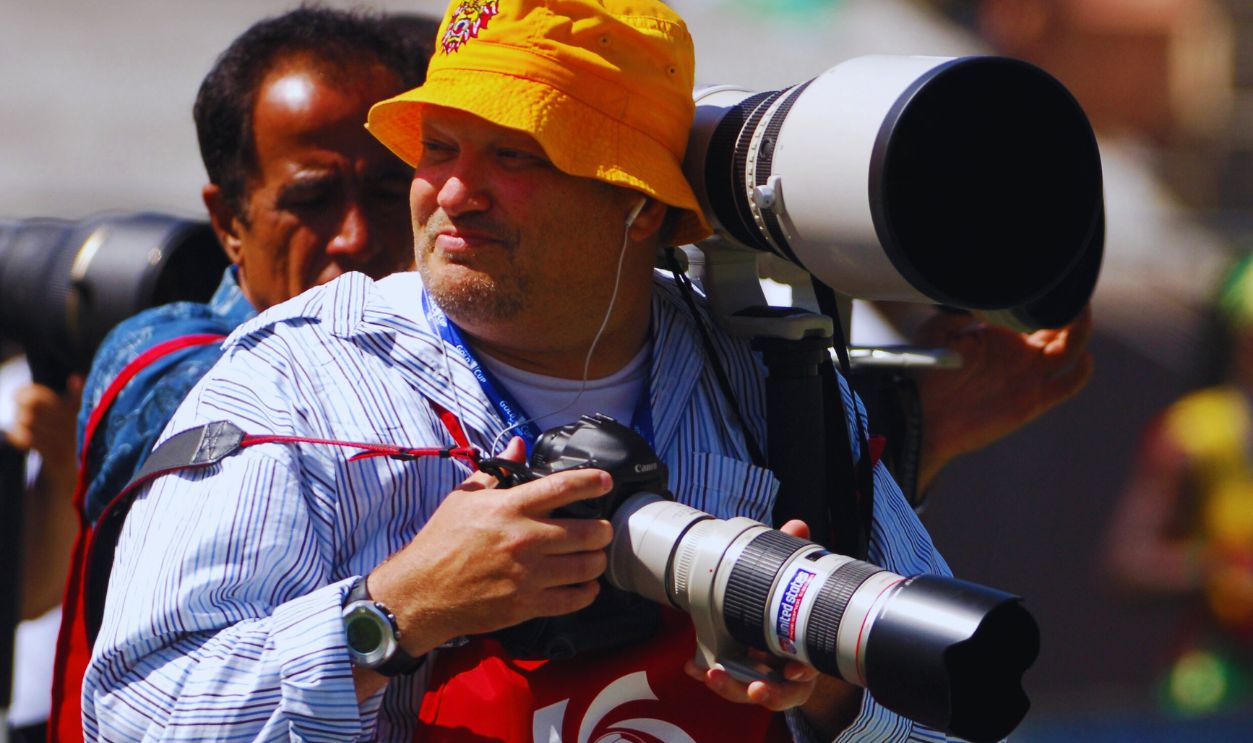 Gettyimages - 117928448, Drew Carey - CONCACAF Gold Cup - July 10, 2005 Drew Carey moonlights as a photographer at CONCACAF Gold Cup soccer match between Jamaica and South Africa at the Los Angeles Memorial Coliseum on Sunday, July 10, 2005.