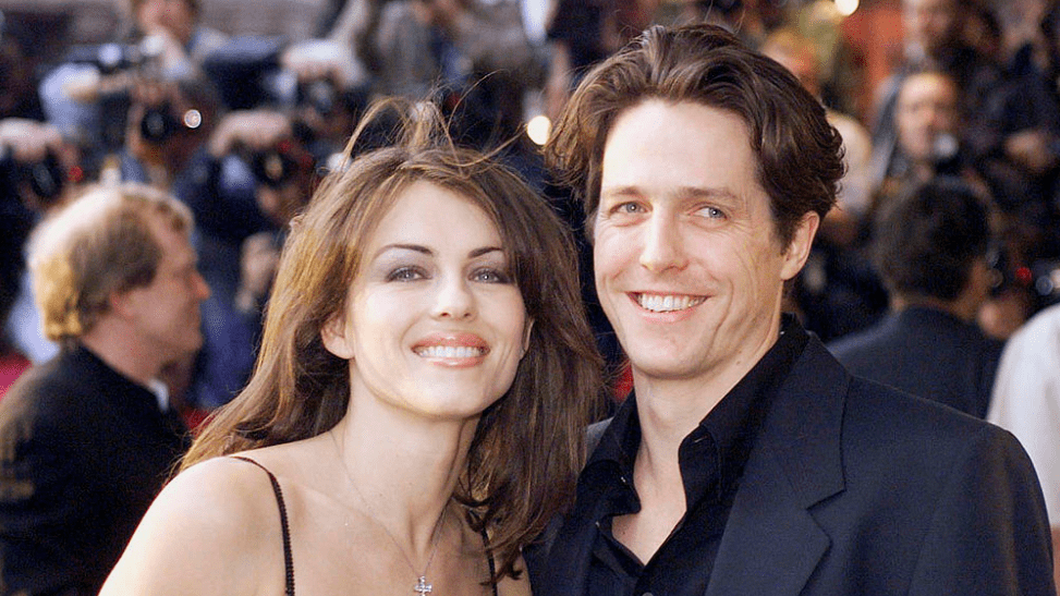 Liz Hurley and Hugh Grant arrive at the London premiere of the film 'Notting Hill' April 17, 1999.