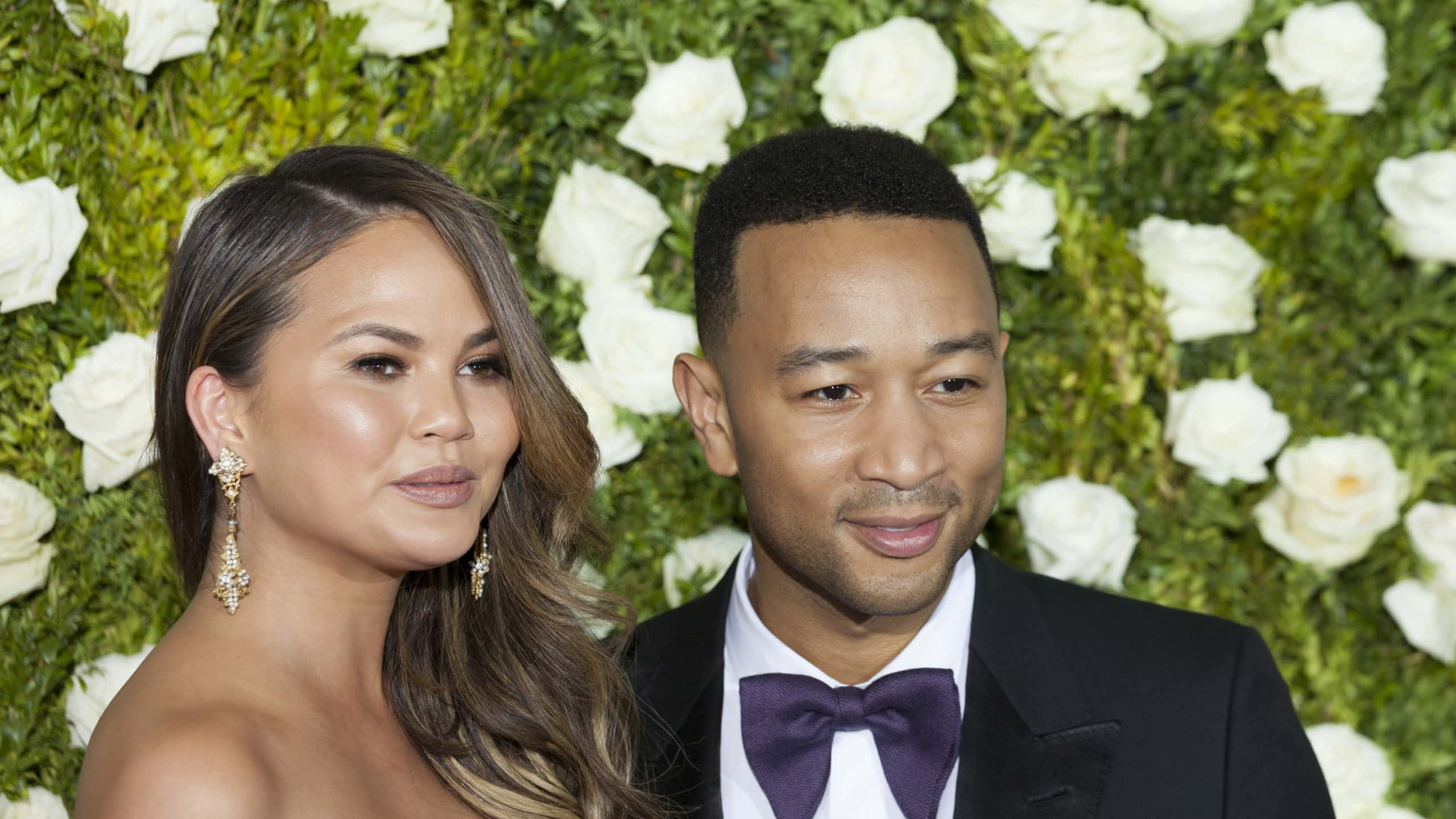 Chrissy Teigen in Pamella Roland and John Legend attend Tony awards 2017