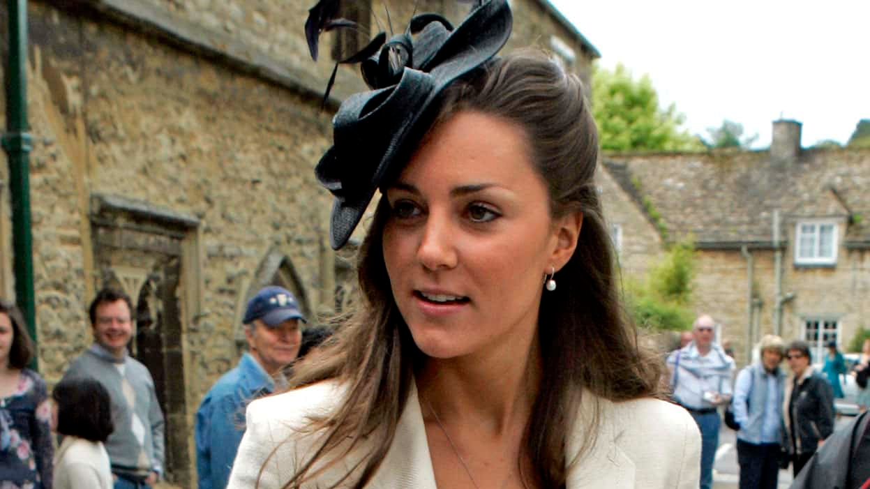 Kate Middleton wearing a white jacket