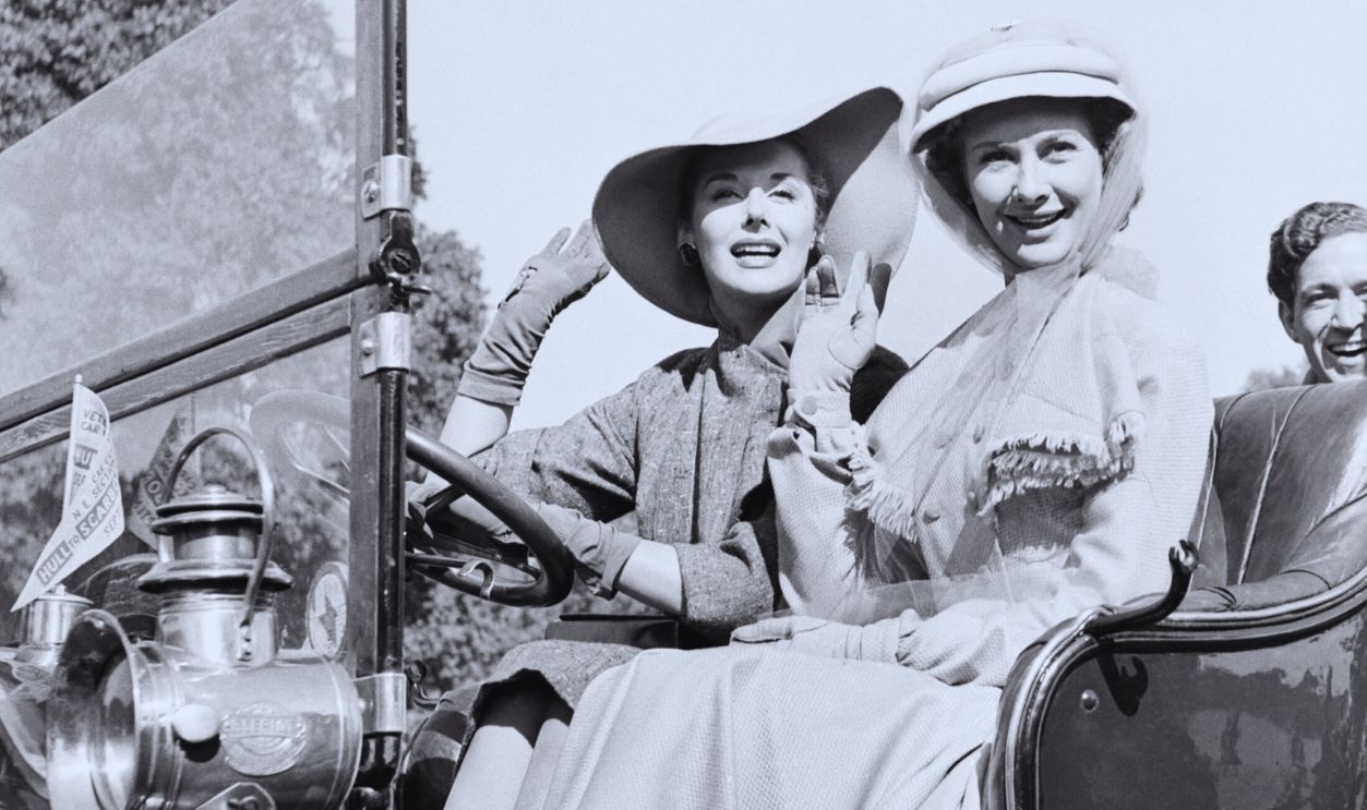 Gettyimages - 1450363479, Kay Kendall, Dinah Sheridan, John Gregson and Kenneth Moore... Filming of Genevieve. Left to right: Kay Kendall, Dinah Sheridan, John Gregson and Kenneth Moore. September 1952.