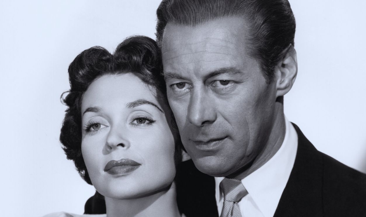   Gettyimages - 1358156259, Lilli Palmer and Rex Harrison in 'The Four Poster' German Actress Lilli Palmer (1914-1986) as 'Abby Edwards' with her then off-screen real husband, British Actor Rex Harrison (1908-1990) as 'John Edwards' in a publicity shot from their third and last movie appearance together, 'The Four Poster', 1952, United States.