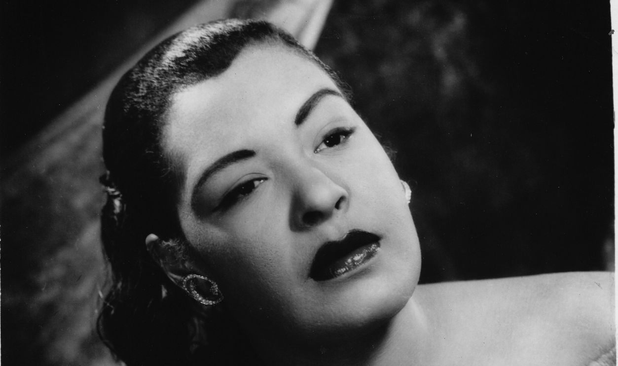 Billie Holiday poses for a studio portrait in 1955 in the United States. 