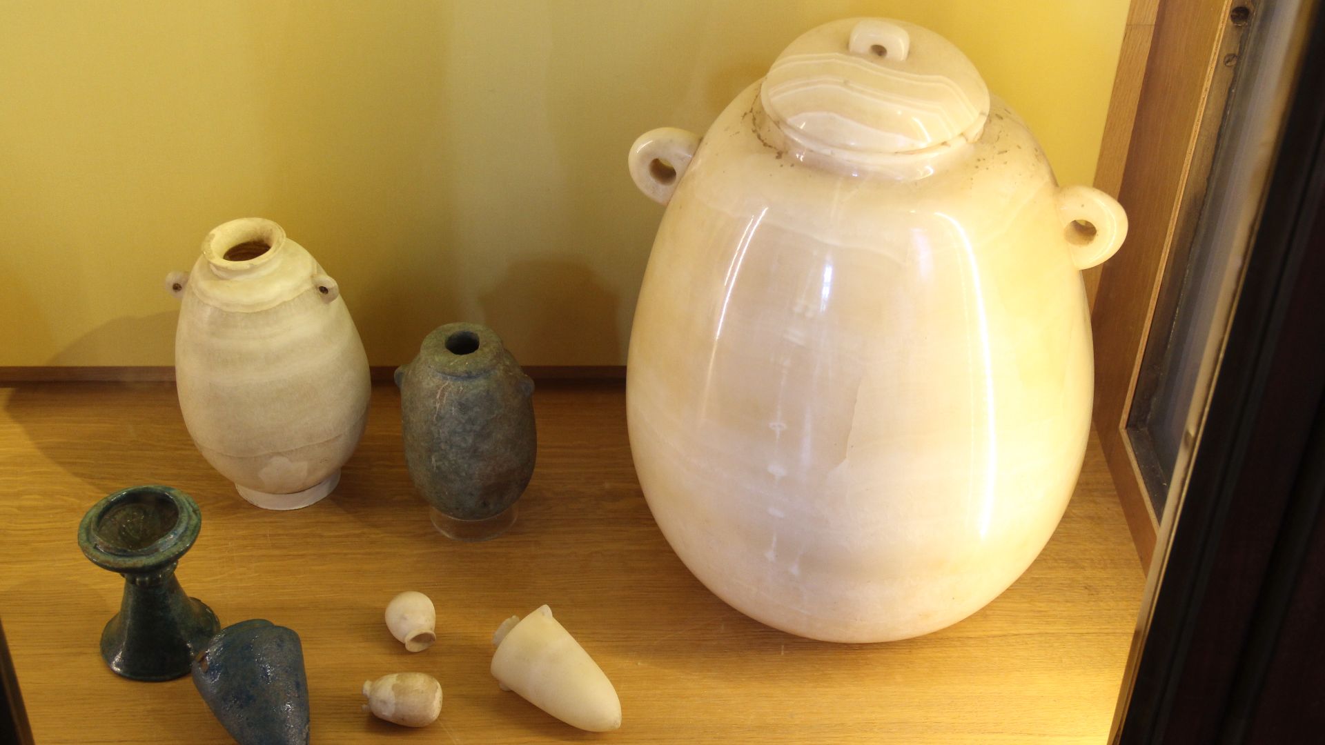 File:Ancient Egypt Stone Bottles & Alabaster Vase (27808981853).jpg