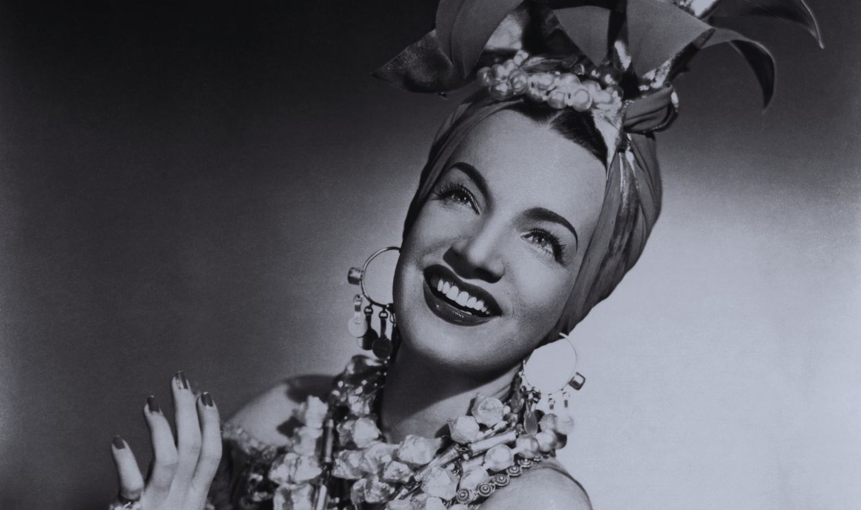 Gettyimages - 502011699, Carmen Miranda Portuguese-Brazilian singer, dancer and actress, Carmen Miranda (1909 - 1955), in one of her trademark outfits, circa 1940.