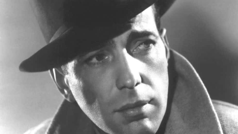 Humphrey Bogart in trench coat and hat