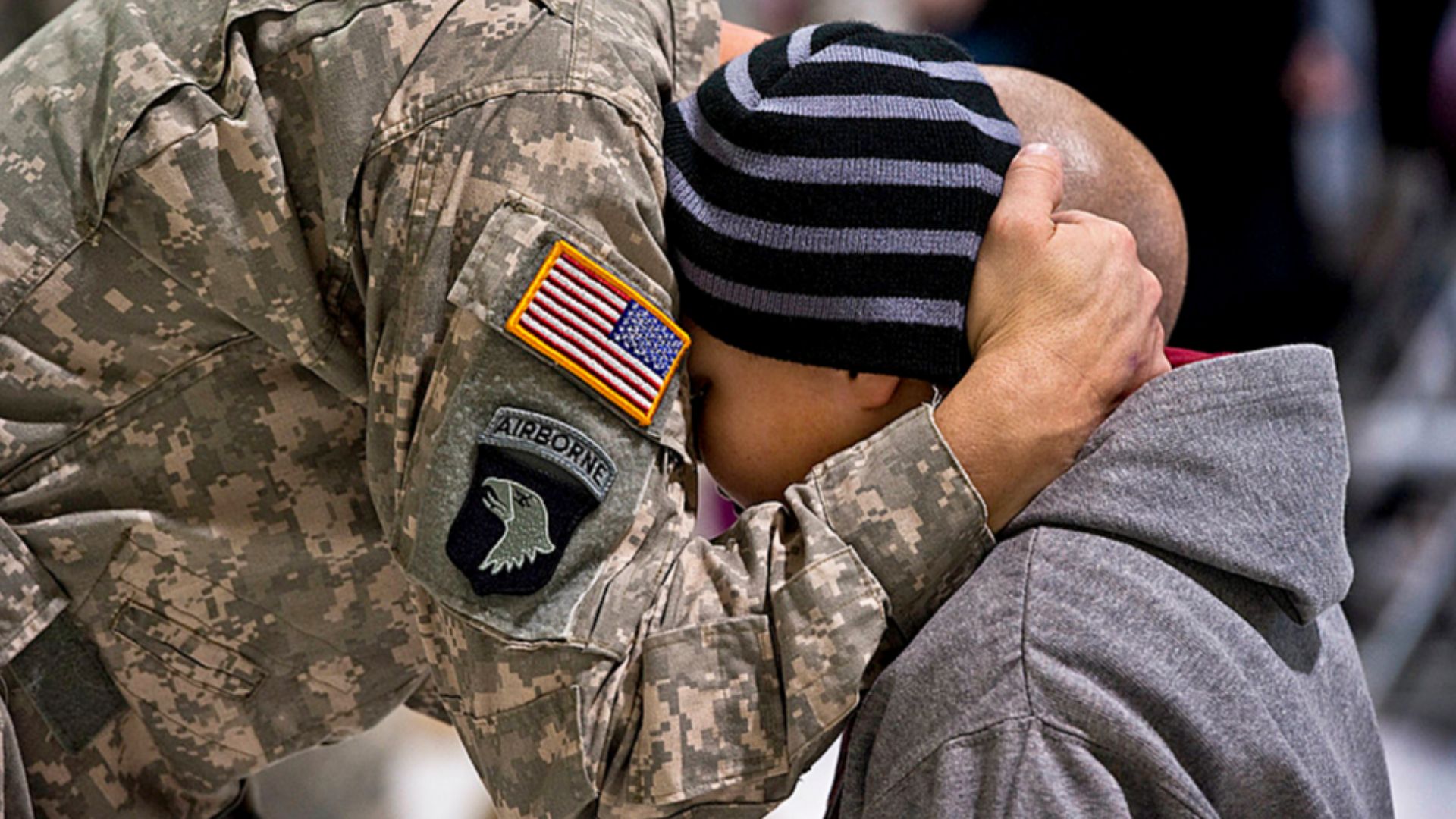 File:A soldier shares a hug and says his goodbye during a farewell ceremony at McEntire Joint National Guard Base 130126-Z-XH297-545.jpg
