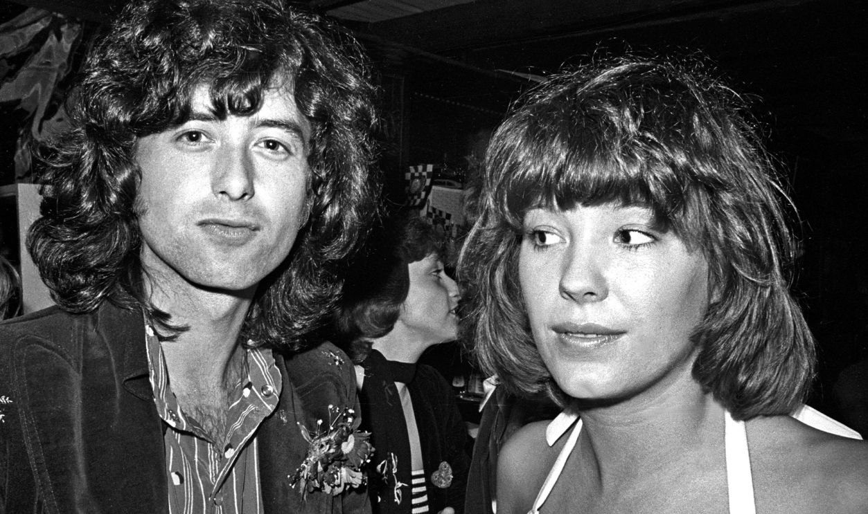 Led Zeppelin guitarist Jimmy Page arrives for an after party at Rodney's English disco accompanied by his girlfriend Miss Pamela (Pamela Des Barres) He will leave the party with the teenage Lori Maddox on June 3, 1973 in Los Angeles, California. 